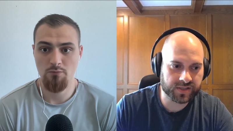 ~20 minute split-screen: host looking down at screen, guest wood paneling; spoken materialized views and interactive response, no performance charts.